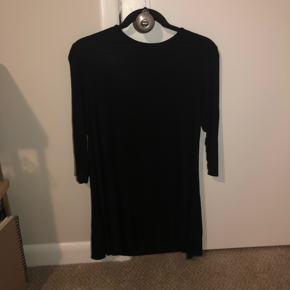 black t-shirt dress. about mid thigh